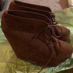Brown wedge booties